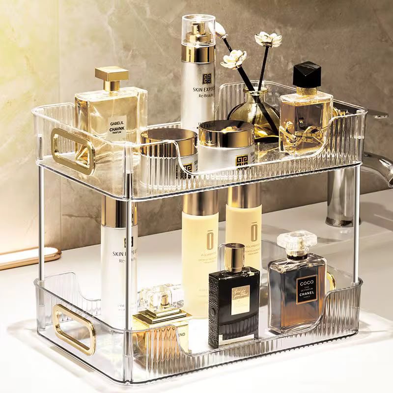 2-Tier Countertop Organizer - clear gold handles with perfumes and skincare in bathroom