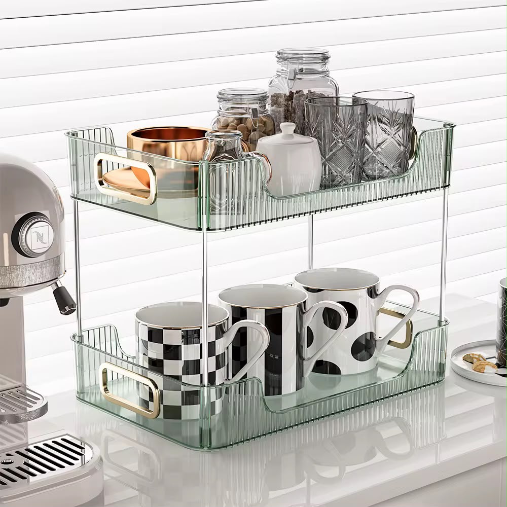 2-Tier Countertop Organizer - sage green kitchen setting with checkered mugs