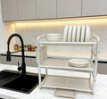 3-Tier Aluminum Dish Drying Rack on marble countertop next to black sink - loaded with plates and bowls