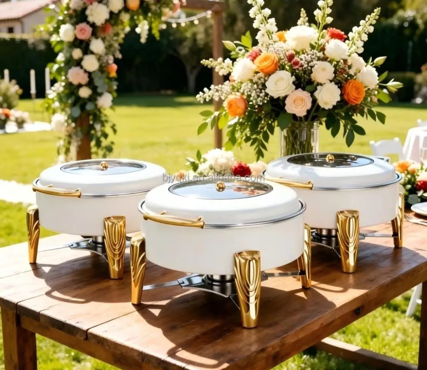 White and Gold Square Hydraulic Chafing Dishes set up at outdoor garden wedding with flowers