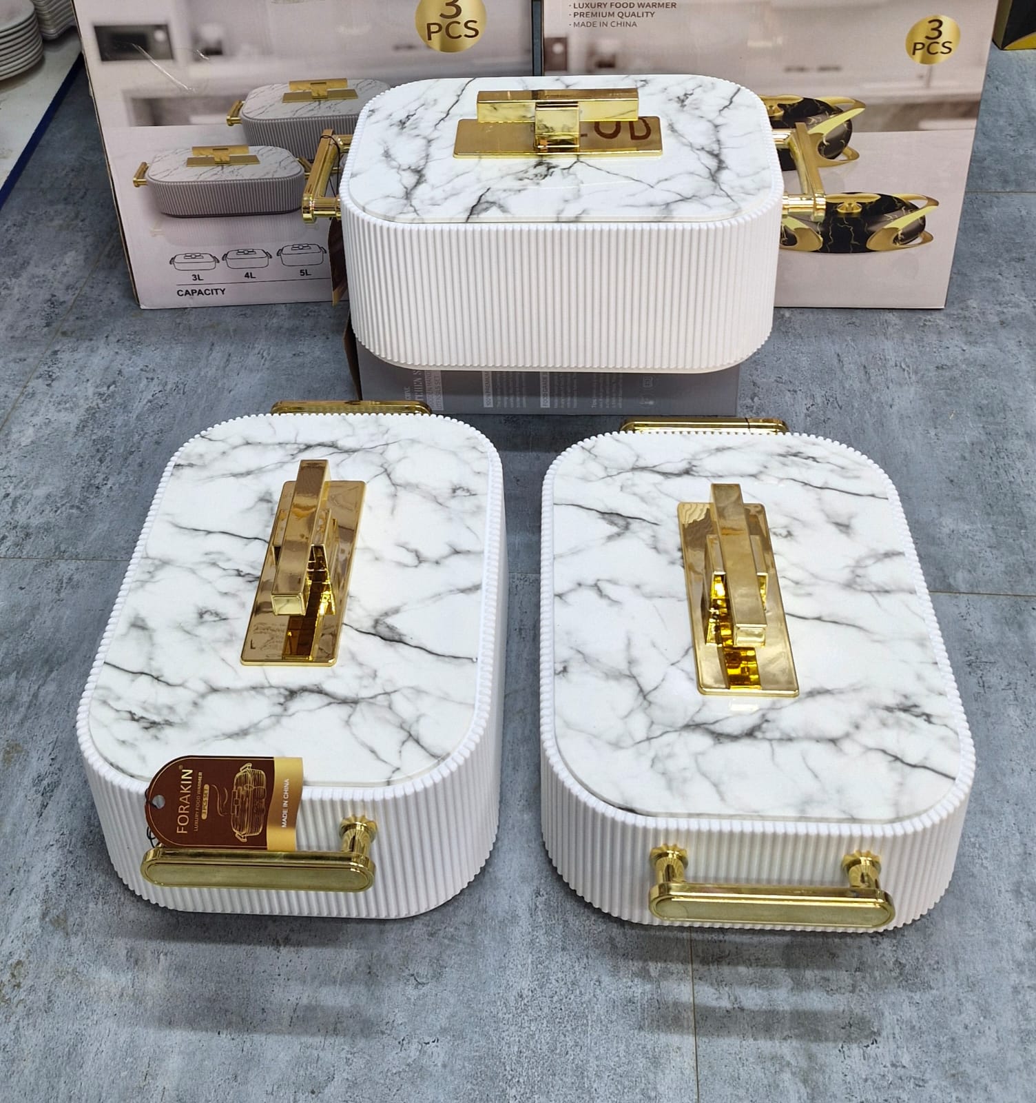 Forakin 3pcs White Marble and Gold Food Warmer Set store display showing all 3 sizes
