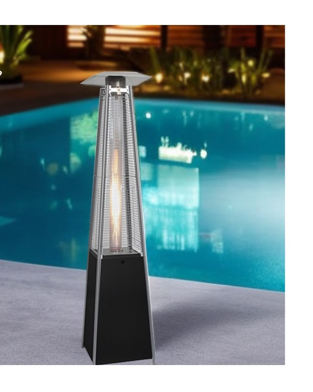 Pyramid gas patio heater with quartz flame tube beside a swimming pool at night