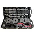 Open black carry case with weight plates, chrome dumbbell and barbell rods, EZ curl bar and spinlock collars.
