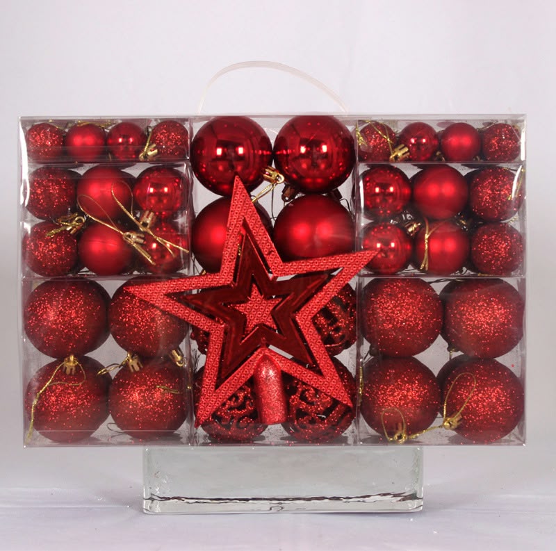 101-piece red Christmas bauble set with matte, shiny and glitter ornaments and a red star tree topper in a clear box