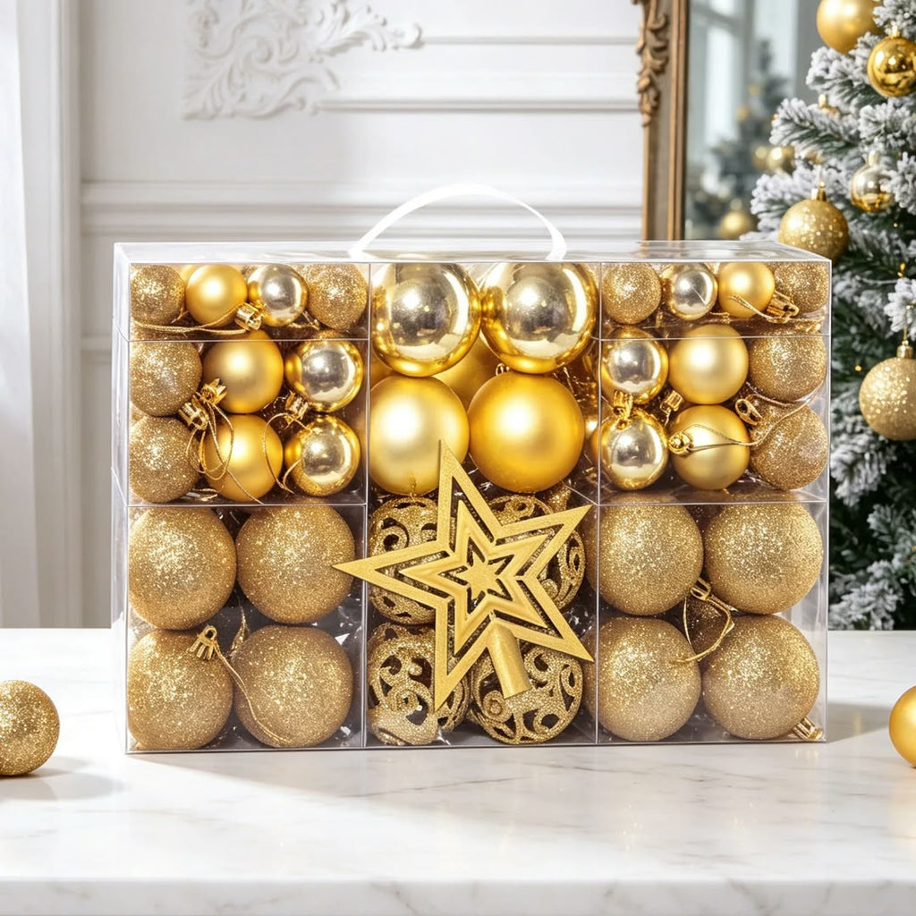 101-piece gold Christmas bauble set with matte, shiny and glitter ornaments and a gold star tree topper in a clear carry box