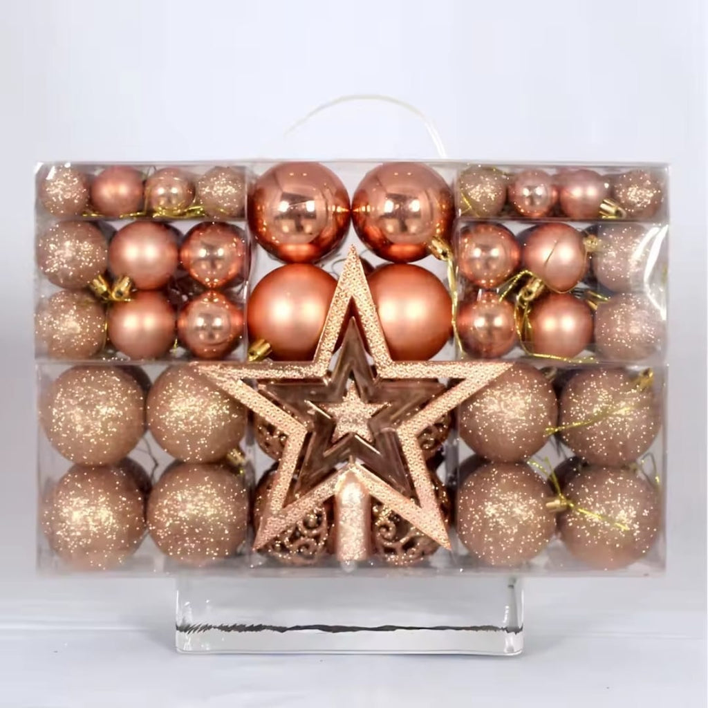 101-piece rose gold Christmas bauble set with matte, shiny and glitter ornaments and a rose gold star tree topper in a clear box